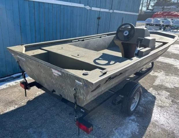 Slide: The Image of 2024 Tracker Grizzly 1648 SC boat on trailer, parked outdoors. - 3