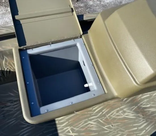 Slide: The Image of Open storage compartment on 2024 Tracker Grizzly 1648 SC boat. - 7