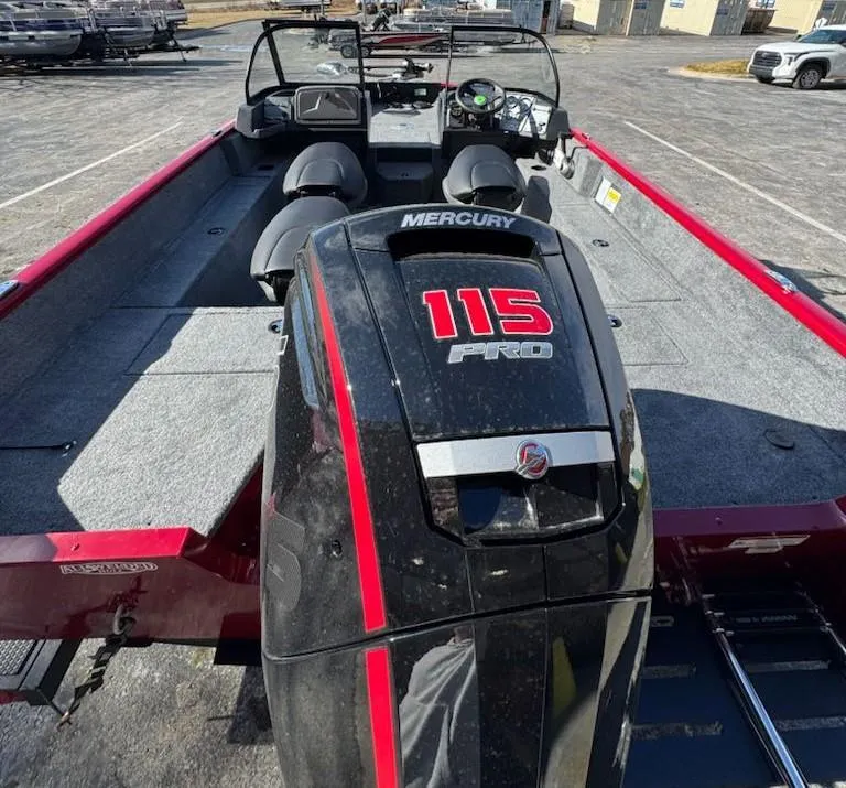 Slide: The Image of 2025 Tracker Pro Guide V-175 WT boat with Mercury 115 Pro engine, parked outdoors. - 4