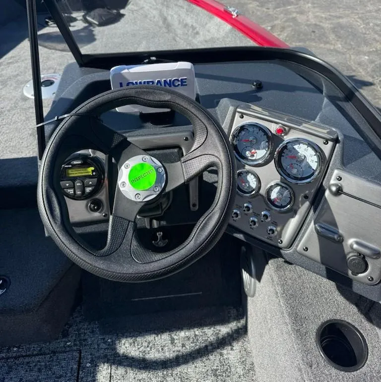 Slide: The Image of 2025 Tracker Pro Guide V-175 WT dashboard with steering wheel and gauges. - 6