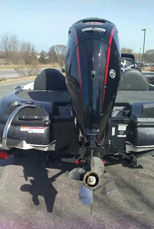 Slide: The Image of 2025 Nitro Z17 boat with powerful outboard motor, parked outdoors. - 5