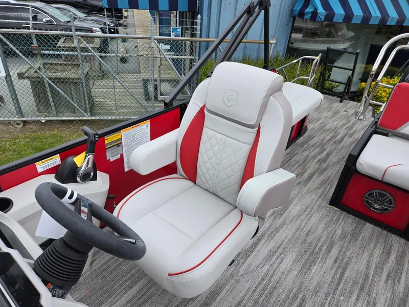 Slide: The Image of 2025 Godfrey SWEETWATER 2286 SFL boat with luxurious seating and modern design. - 11