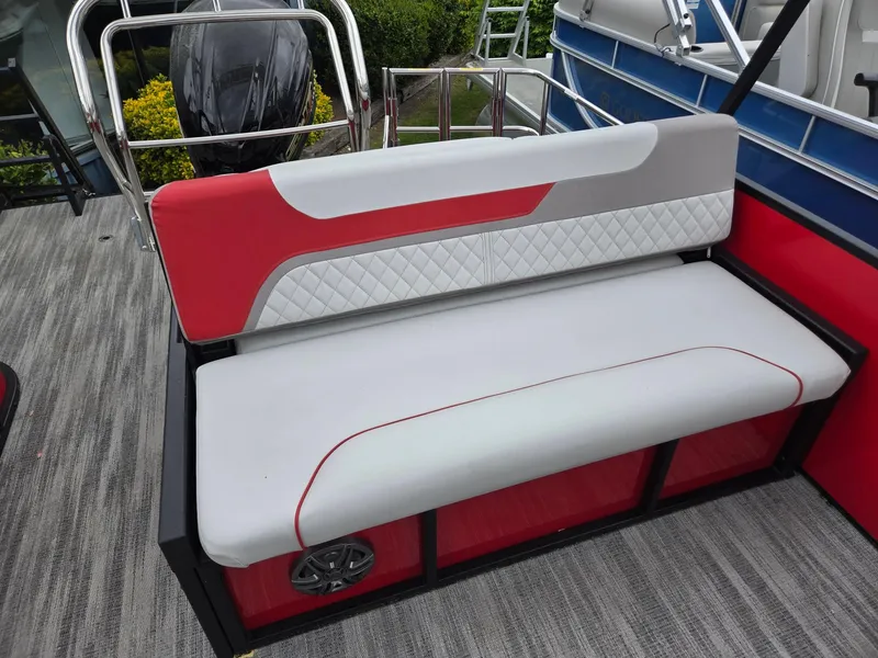 Slide: The Image of 2025 Godfrey SWEETWATER 2286 SFL boat seat with red and gray upholstery. - 19