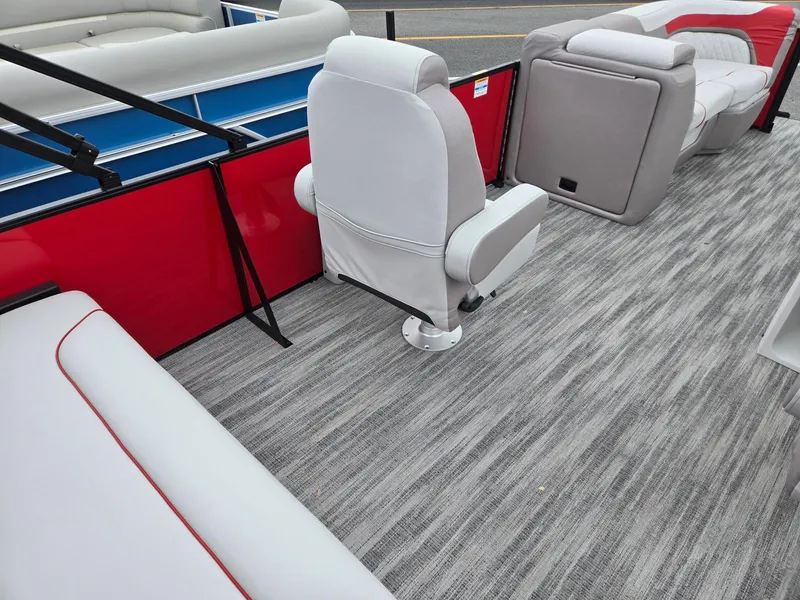 Slide: The Image of Interior of 2025 Godfrey SWEETWATER 2286 SFL pontoon boat with gray seating and flooring. - 25