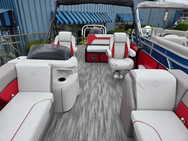 Slide: The Image of 2025 Godfrey SWEETWATER 2286 SFL pontoon boat with spacious seating and modern design. - 6