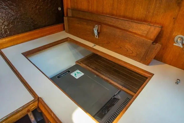 Slide: The Image of Wooden interior of 1971 Ericson 39 Flush Deck sailboat with built-in storage. - 33