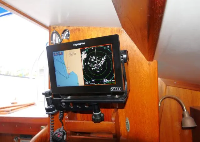 Slide: The Image of Raymarine navigation system on 1971 Ericson 39 Flush Deck sailboat interior. - 42