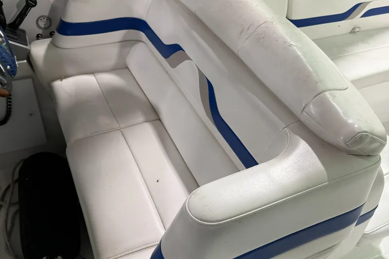 Slide: The Image of White and blue seating in a 2002 Formula 400 Super Sport boat. - 14