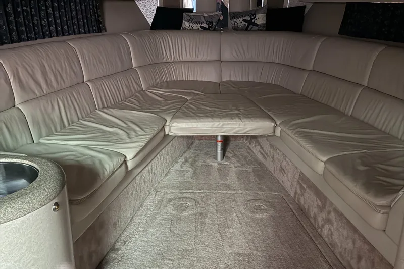 Slide: The Image of Luxurious interior of a 2002 Formula 400 Super Sport boat with plush seating. - 16