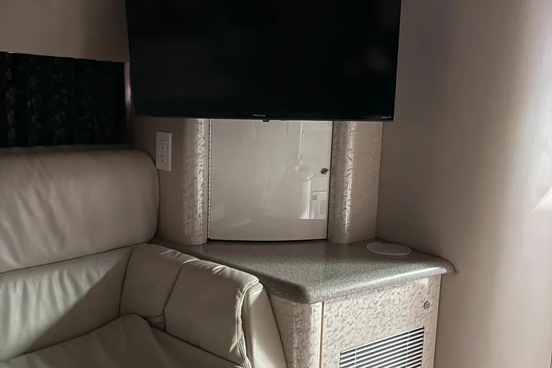 Slide: The Image of Interior of 2002 Formula 400 Super Sport with TV and leather seating. - 18