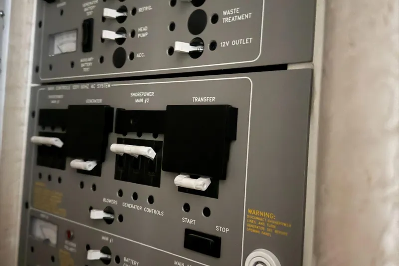 Slide: The Image of Control panel of a 2002 Formula 400 Super Sport boat, featuring various switches and indicators. - 19