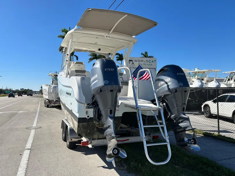 Slide: The Image of 2022 World Cat 255DC boat with twin Yamaha engines on a trailer. - 10