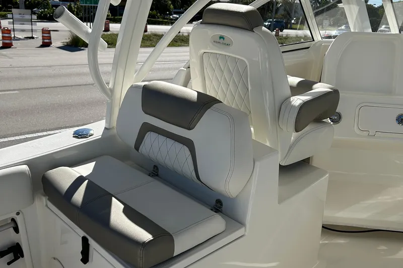 Slide: The Image of 2022 World Cat 255DC boat interior with cushioned seating and modern design. - 25