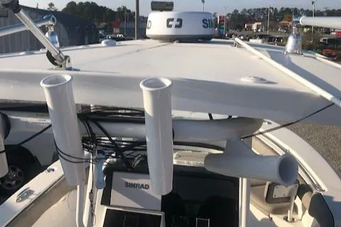 Slide: The Image of 2021 Sea Pro 259 DLX boat with rod holders and Simrad electronics. - 16