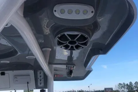 Slide: The Image of 2021 Sea Pro 259 DLX boat roof with speaker and LED lights. - 17