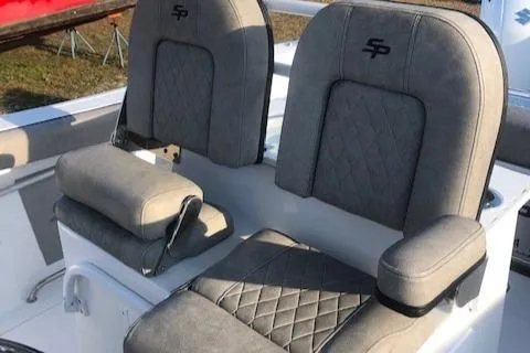 Slide: The Image of 2021 Sea Pro 259 DLX boat seats with quilted gray upholstery. - 8