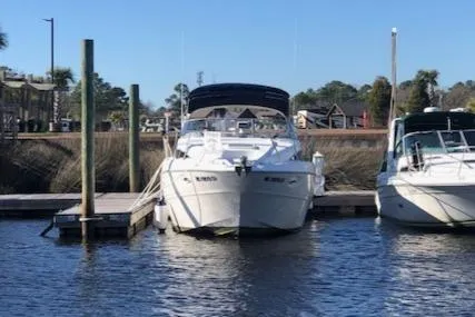 Slide: The Image of 2000 Bayliner 3055 Ciera docked at marina, sunny day. - 34
