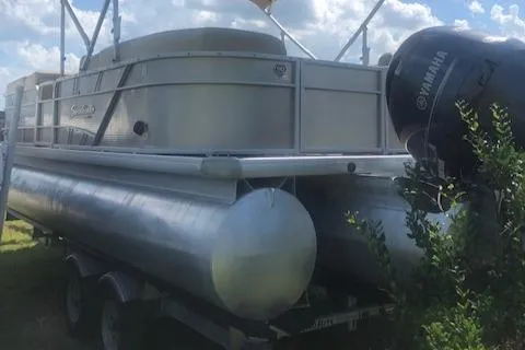 Slide: The Image of 2018 Godfrey Sweetwater 2286C pontoon boat with Yamaha motor on trailer. - 4