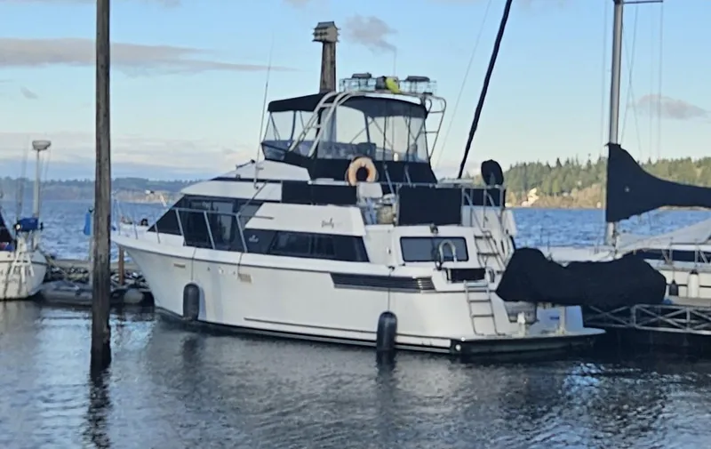Slide: The Image of 1991 Tollycraft Euro Sport Sedan yacht docked in a marina. - 0