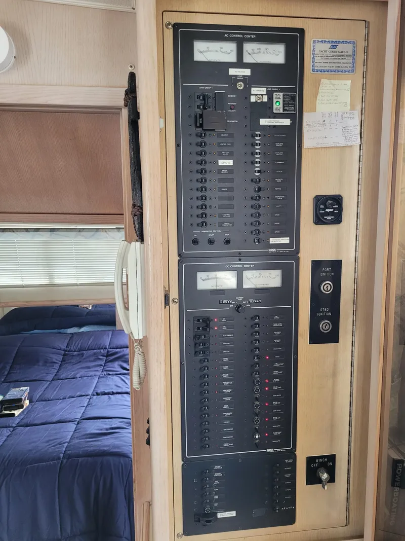 Slide: The Image of Electrical panel inside 1991 Tollycraft Euro Sport Sedan boat cabin. - 34
