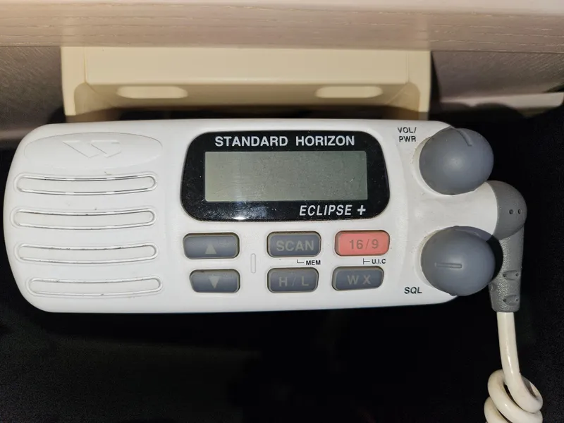 Slide: The Image of Standard Horizon Eclipse+ marine radio on 1991 Tollycraft Euro Sport Sedan. - 47