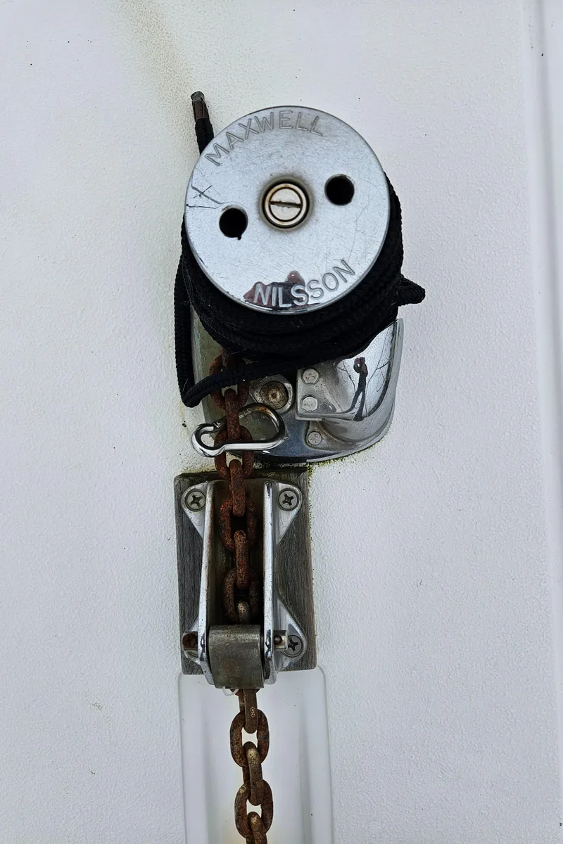 Slide: The Image of Anchor windlass on 1991 Tollycraft Euro Sport Sedan boat. - 6