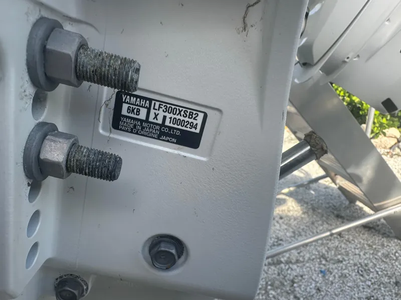 Slide: The Image of Close-up of Yamaha LF300XSB2 engine on 2021 Robalo R302 Center Console boat. - 36