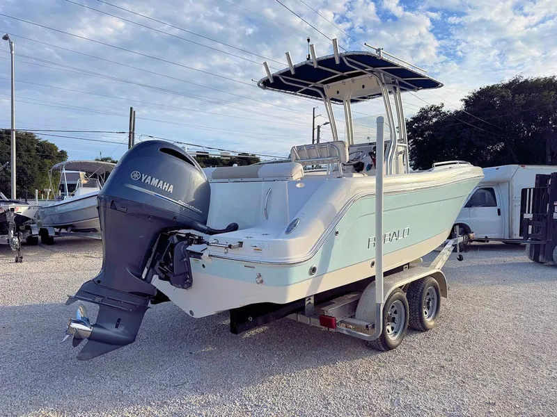 Slide: The Image of 2016 Robalo R222 Center Console boat with Yamaha outboard on trailer. - 2