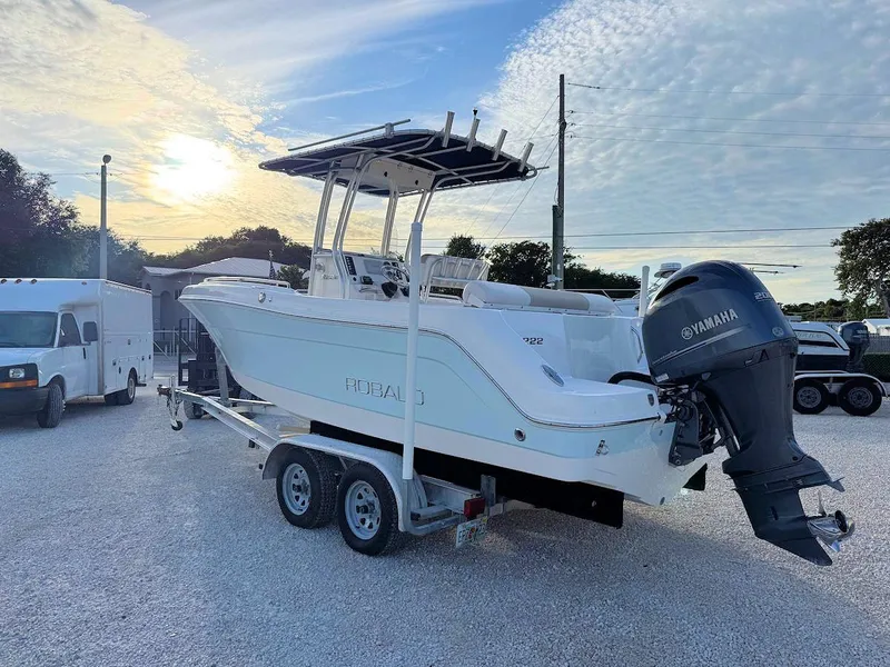 Slide: The Image of 2016 Robalo R222 Center Console boat on trailer with Yamaha outboard motor. - 3