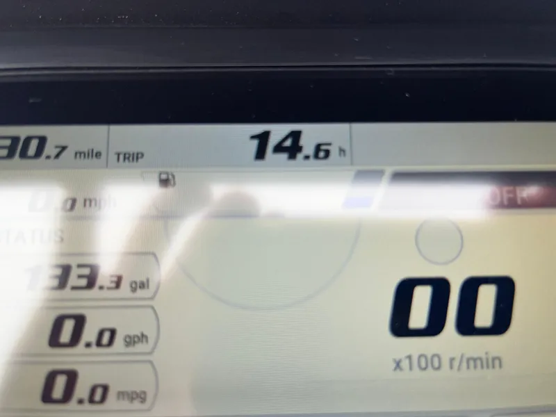 Slide: The Image of Dashboard display of a 2024 Bennington 25LTFB showing trip data and fuel status. - 12