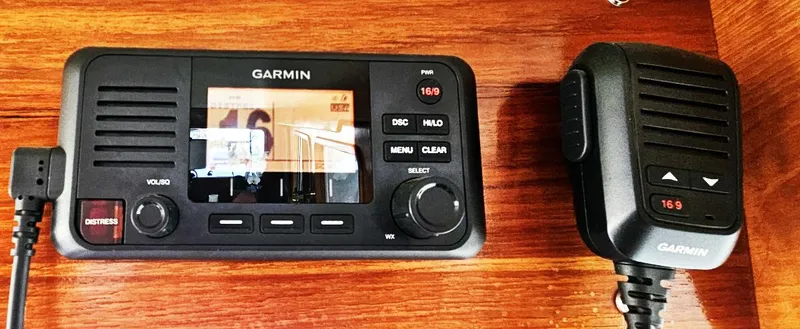 Slide: The Image of Garmin marine radio and microphone on Ocean Alexander 43, 1983 model. - 24