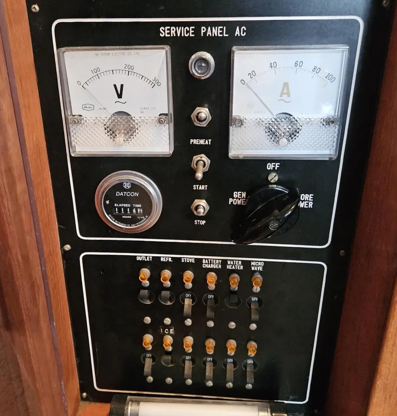 Slide: The Image of Service panel with voltmeter and ammeter on 1983 Ocean Alexander 43 yacht. - 32