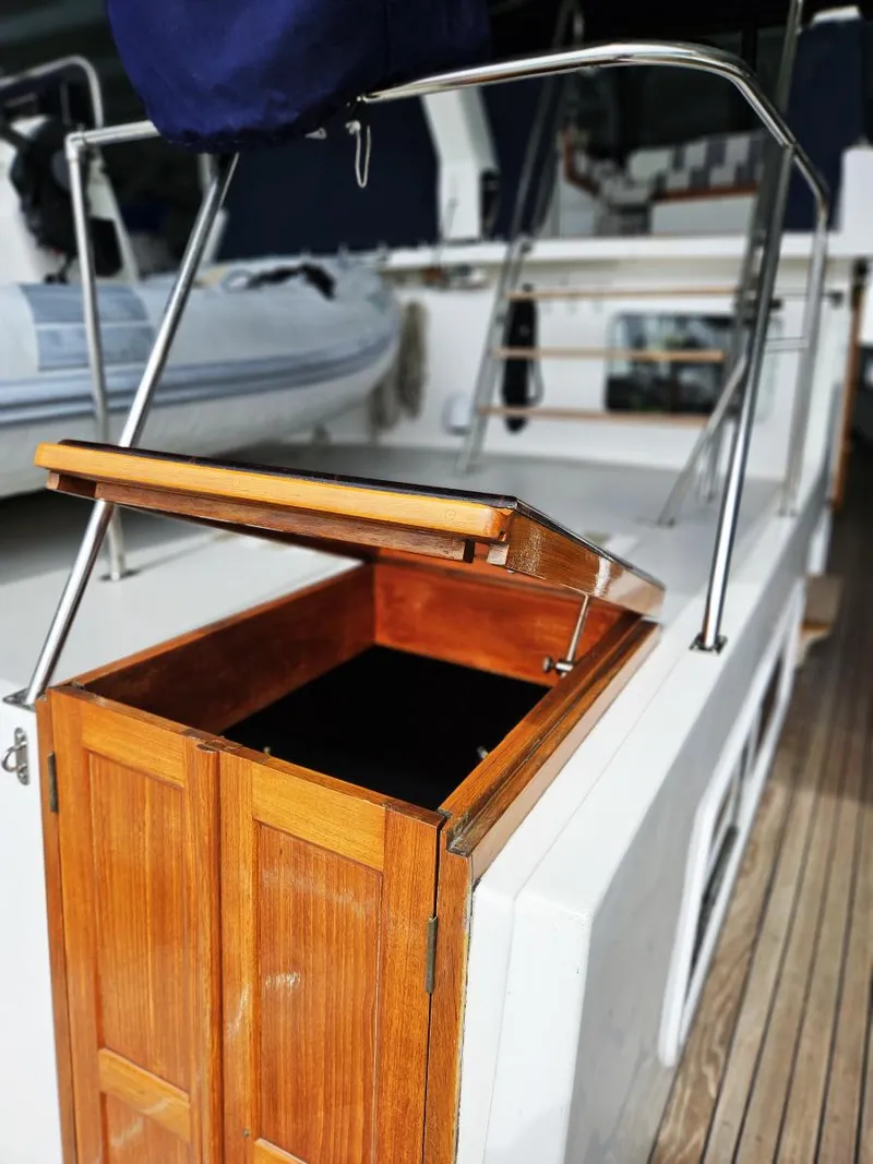 Slide: The Image of 1983 Ocean Alexander 43 yacht with open wooden hatch on deck. - 9