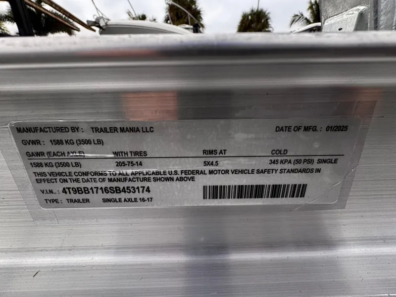 Slide: The Image of Trailer label showing specifications and safety standards, manufactured by Trailer Mania LLC in 2025. - 18