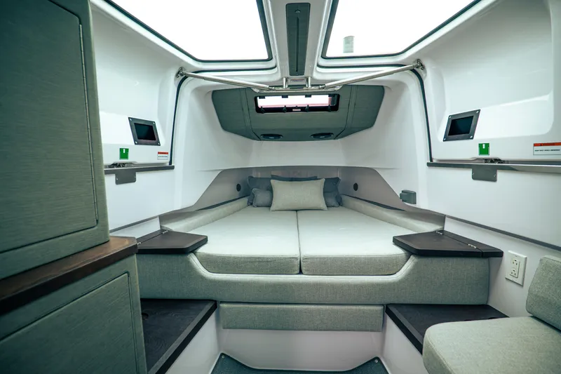 Slide: The Image of Luxurious interior of 2023 Axopar Michael Vrbas boat with modern design and comfortable seating. - 16