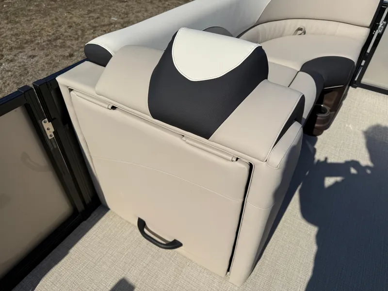 Slide: The Image of 2025 Tahoe Pontoon LTZ Quad Lounger, beige and black seating detail, outdoor setting. - 11