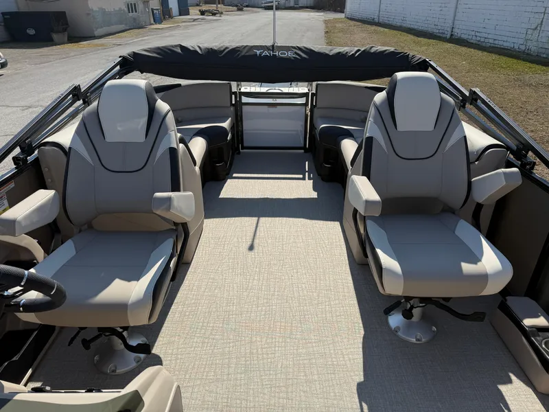 Slide: The Image of 2025 Tahoe Pontoon LTZ Quad Lounger interior with plush seating and modern design. - 12