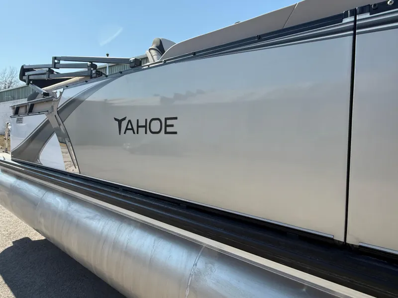 Slide: The Image of 2025 Tahoe Pontoon LTZ Quad Lounger, sleek design, side view. - 17