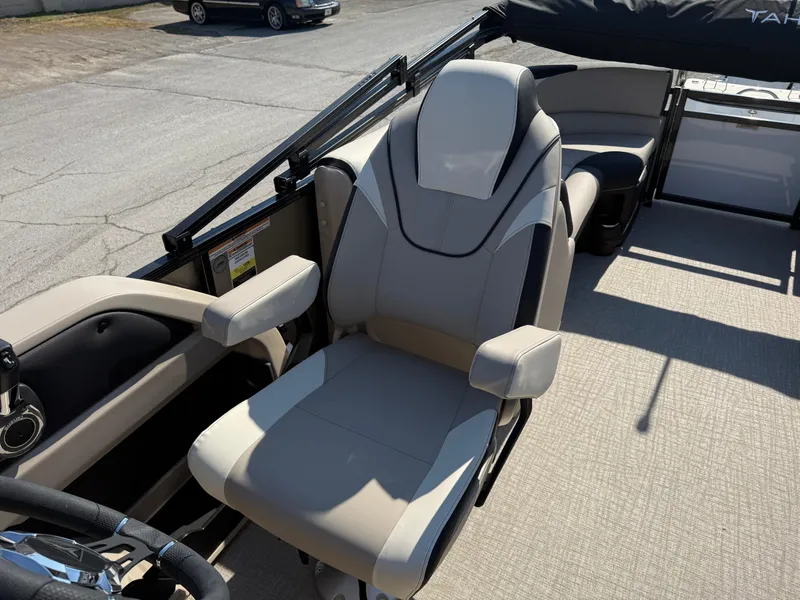 Slide: The Image of 2025 Tahoe Pontoon LTZ Quad Lounger with luxurious seating and modern design. - 5