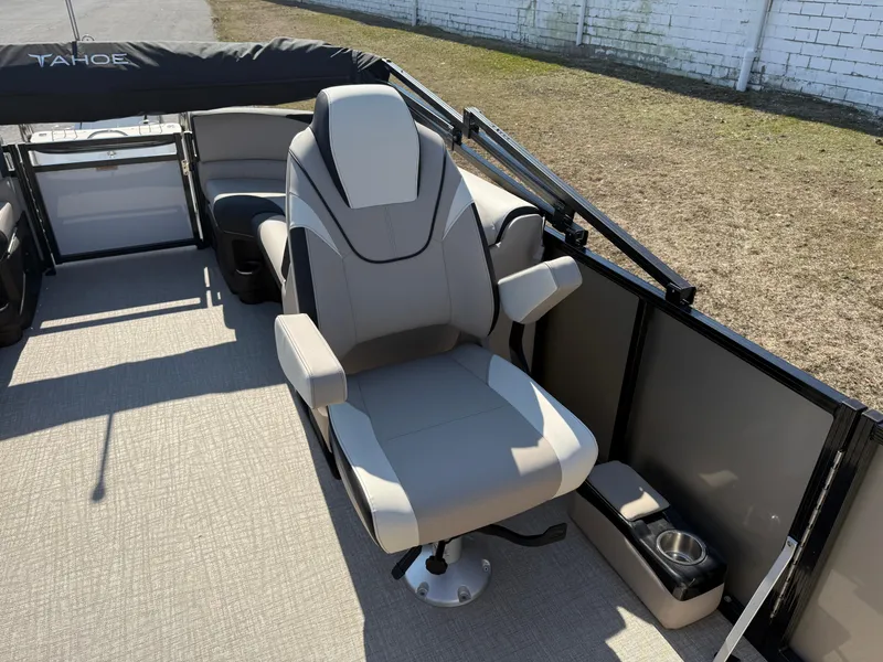 Slide: The Image of 2025 Tahoe Pontoon LTZ Quad Lounger with comfortable seating and sleek design. - 6
