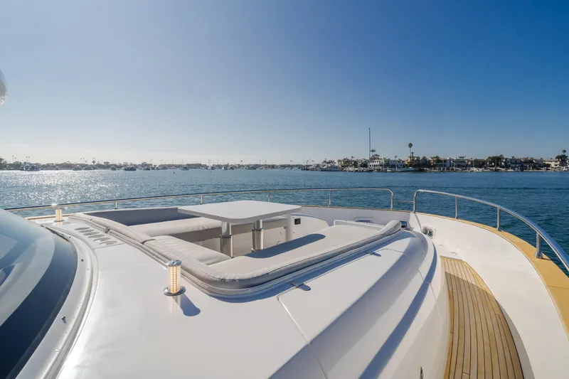 Slide: The Image of Azimut Magellano 66 yacht deck, 2023 model, overlooking serene ocean view. - 11