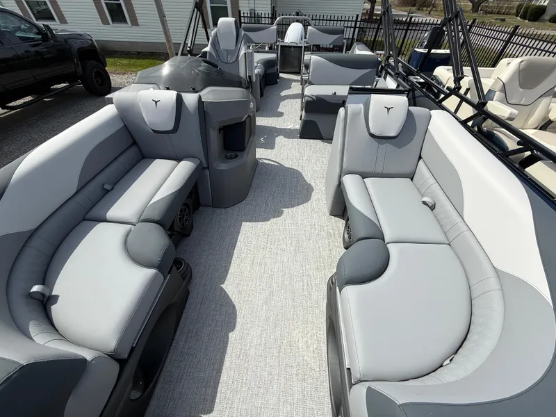 Slide: The Image of 2025 Tahoe Pontoon LTZ Quad Lounger Shift with luxurious gray seating and spacious layout. - 4
