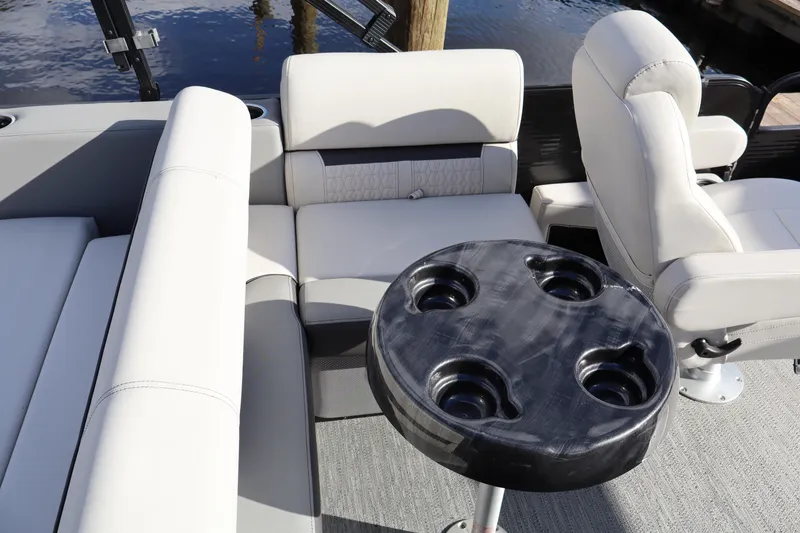 Slide: The Image of Interior of 2022 Godfrey SWEETWATER 2286 SFL pontoon boat with seating and cup holders. - 11