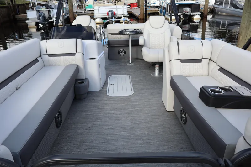 Slide: The Image of 2022 Godfrey SWEETWATER 2286 SFL pontoon boat interior with plush seating and modern design. - 15