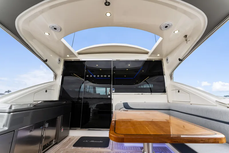 Slide: The Image of Luxurious interior of 2021 Riviera 5400 Sport Yacht with sleek design and modern amenities. - 25