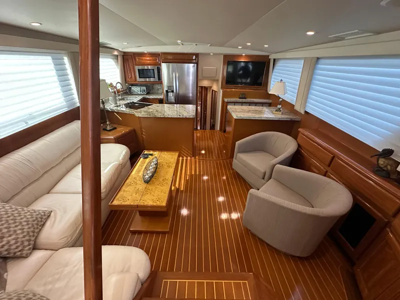 Slide: The Image of Luxurious interior of a 1999 Viking 60 Cockpit Sports Yacht with modern amenities. - 20