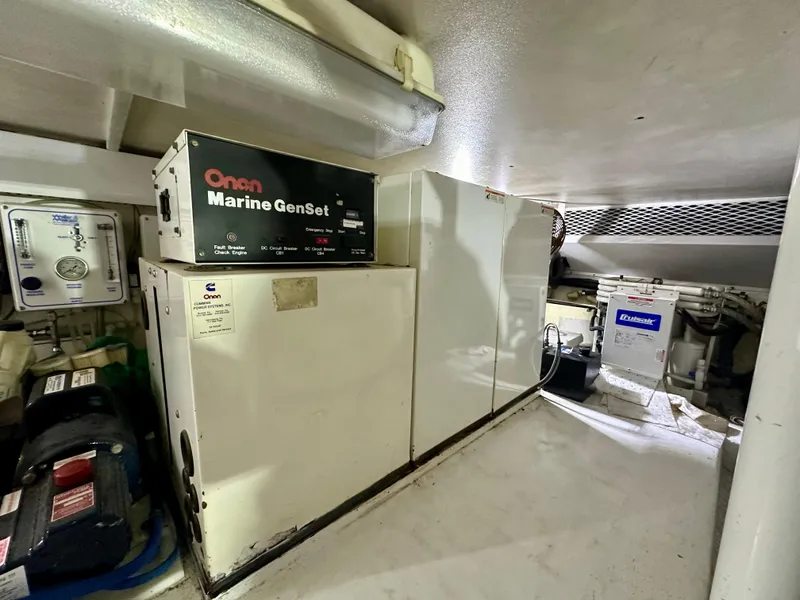 Slide: The Image of Engine room of 1999 Viking 60 Cockpit Sports Yacht with Onan Marine GenSet. - 46