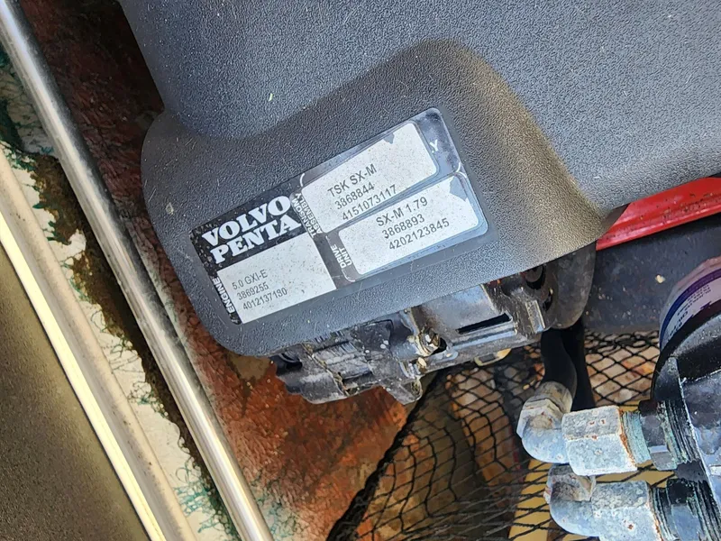 Slide: The Image of Volvo Penta engine component in a 2005 Larson LXi 208 boat. - 12