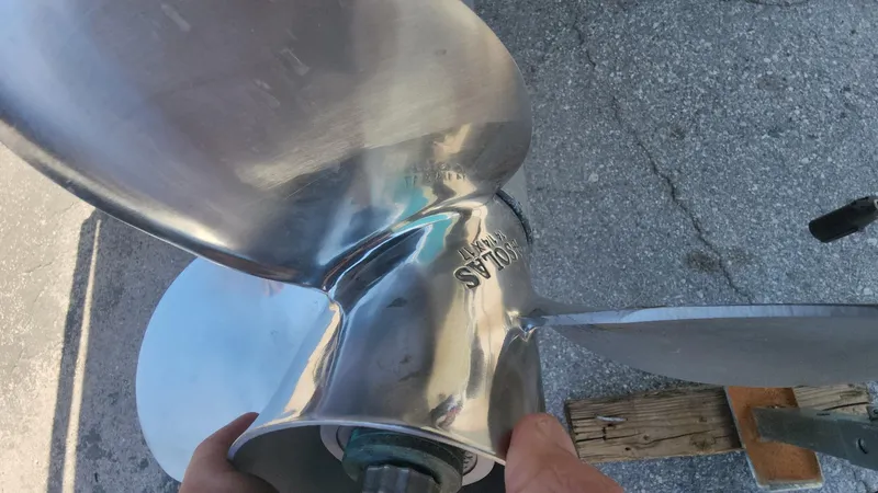Slide: The Image of Close-up of a polished propeller for a 2005 Larson LXi 208 boat. - 20