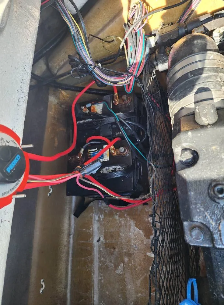 Slide: The Image of Boat battery compartment of 2005 Larson LXi 208 with wiring and components. - 30